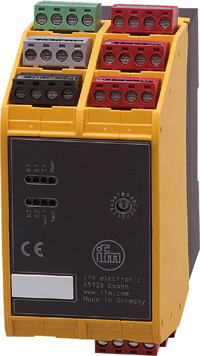 Elektronisches Gerät mit gelbem Gehäuse und diversen Ein- und Ausgängen. Verbindungselemente oben in Schwarz und Rot.