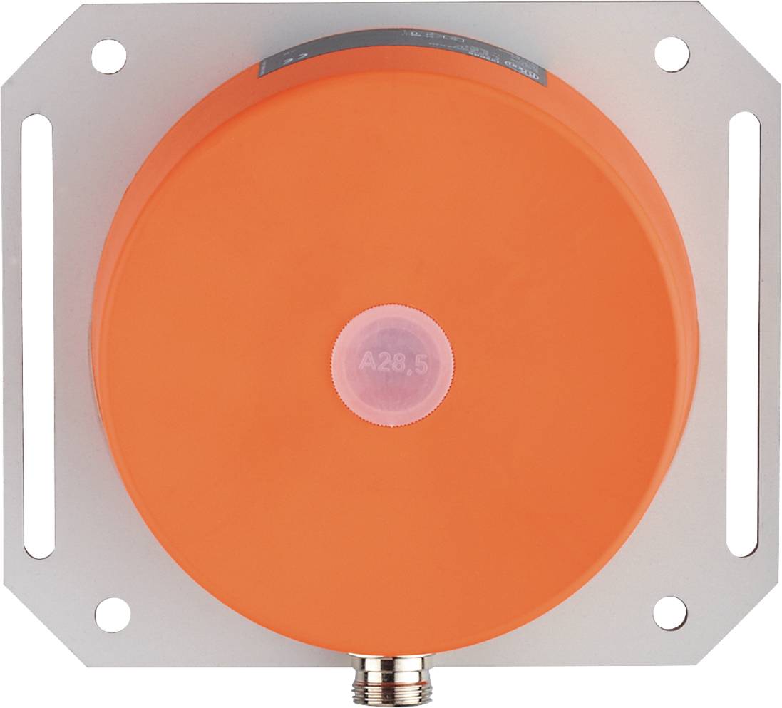 Ein orangefarbenes rundes elektrisches Gerät mit einer zentralen Anschlussstelle.