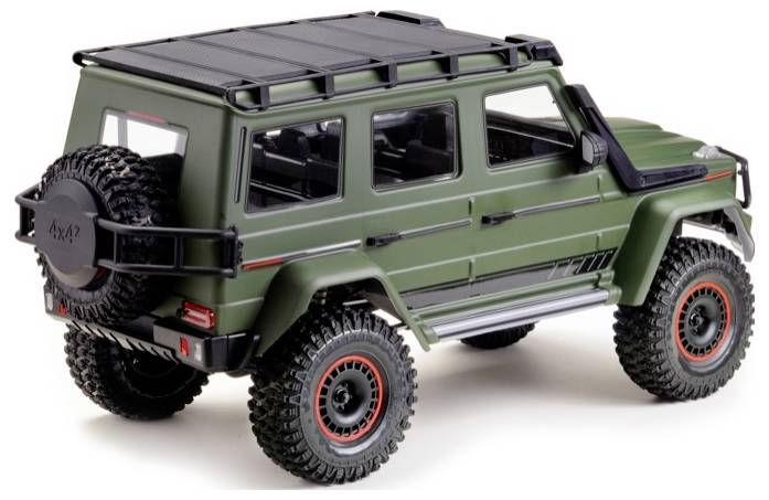 Spielzeug-Geländewagen in olivgrün mit Dachgepäckträger und Reserverad hinten. Robust gestaltet, auf grobstolligen Reifen.