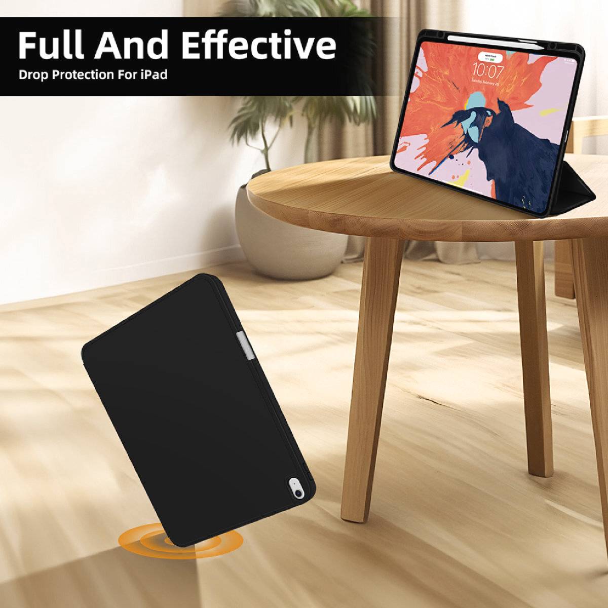 Ein iPad mit einer schützenden Hülle fällt von einem Tisch. Im Hintergrund ist ein weiteres iPad zu sehen, das auf dem Tisch steht.
