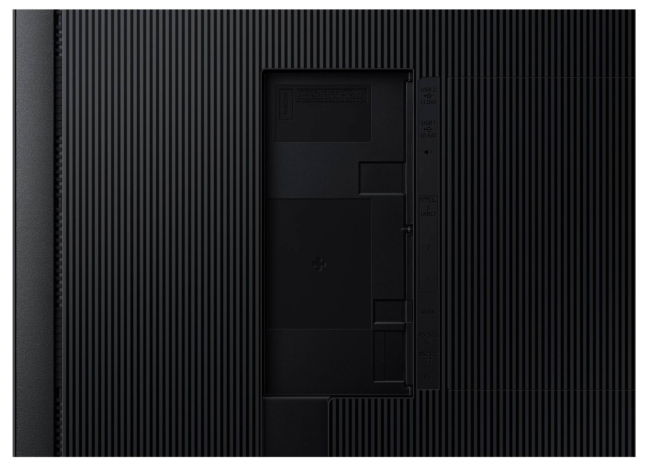 Rückansicht eines Fernsehgeräts mit strukturiertem schwarzen Gehäuse und sichtbarer Anschlussabdeckung, kein Text oder Logos sichtbar.