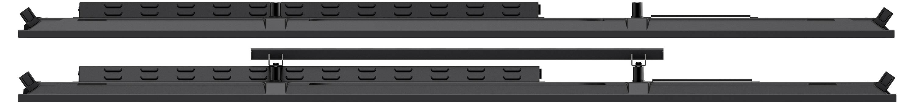 Zwei lange, dünne schwarze Geräte mit einer Reihe von rechteckigen Tasten und Anschlüssen, übereinander dargestellt, vor einem weißen Hintergrund.