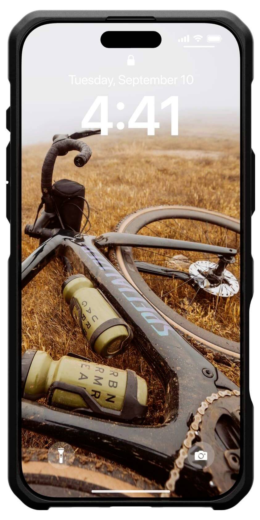 Ein Smartphone zeigt ein Sperrbildschirm mit der Uhrzeit 4:41 und Datum Dienstag, 10. September. Hintergrundbild: Ein Fahrrad auf einer Wiese.