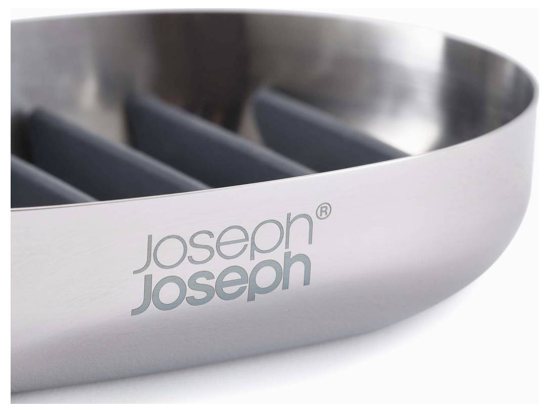 Edles, silbernes Küchenutensil mit blauen Einteilungen, Marke 'Joseph Joseph' auf der Außenseite.