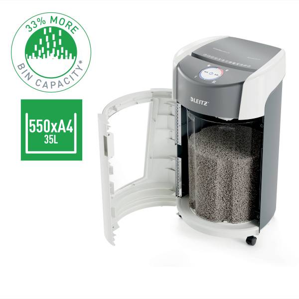 Aktenvernichter mit offenem Behälter, gefüllt mit geschreddertem Papier. Text auf Bild: '33% mehr Fassungsvermögen', '550 x A4, 35L'.