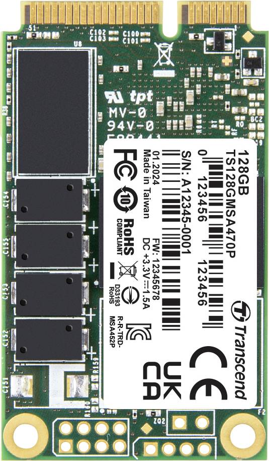 Transcend 128 GB M.2 SSD mit schwarzen Speicherchips und Anschlusspins, die Konformitätskennzeichnungen und Seriennummern zeigt, auf einer grünen Leiterplatte.
