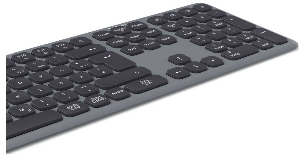 Kabellose, flache Computertastatur in schräger Draufsicht; schwarze Tasten auf grauem Gehäuse; kein Ziffernblock; modern-minimalistisches Design.