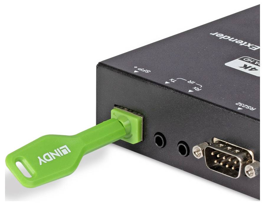 Grüner USB-Sicherheitsschlüssel, der in einen schwarzen USB-auf-Seriell-Adapter mit DB9-Anschluss und audiostyleartigen Buchsen eingesteckt ist