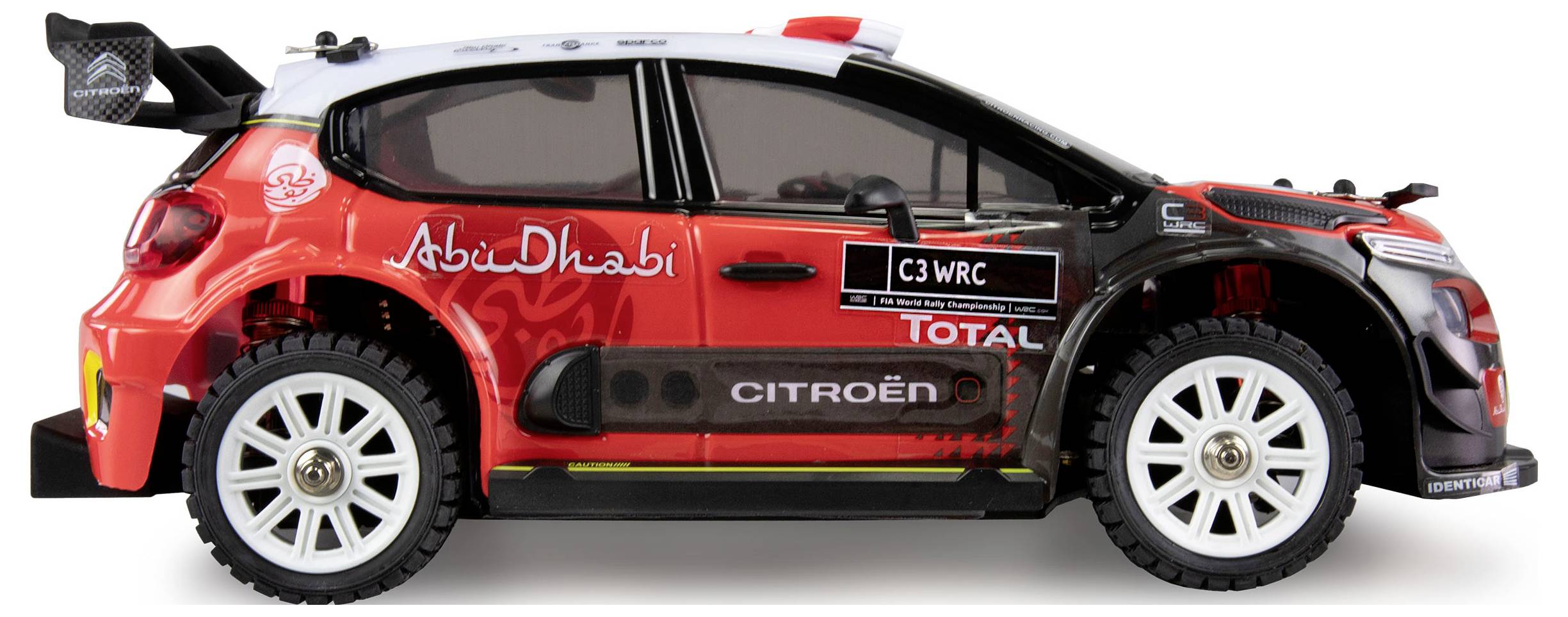 Spielzeugmodell eines roten Citroën C3 WRC Rallyeautos, seitliche Ansicht.
