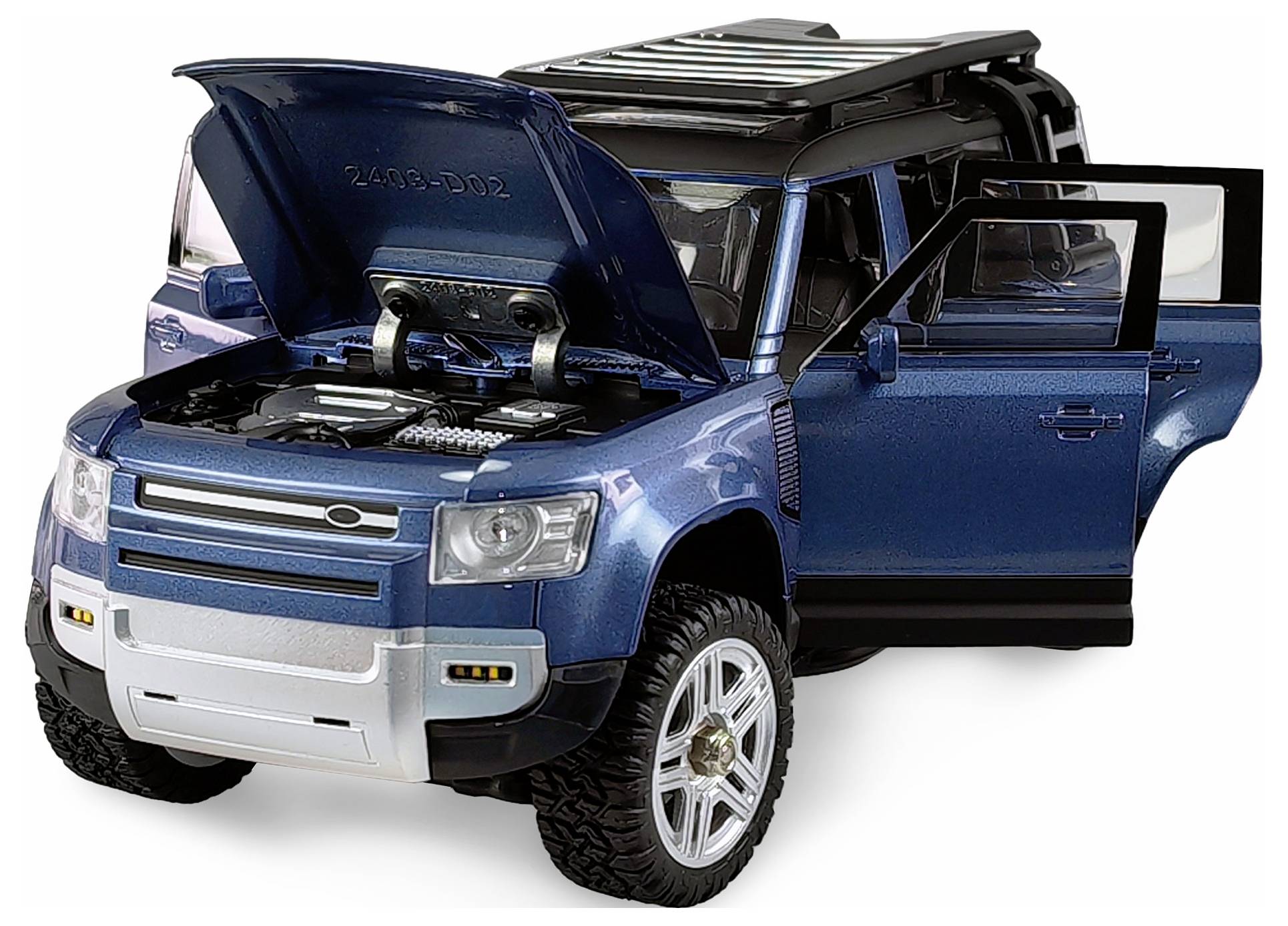 Blaues Modellauto mit geöffnetem Motor und Beifahrertür. Detaillierter Innen- und Motorraum sichtbar. Offenes Dach.