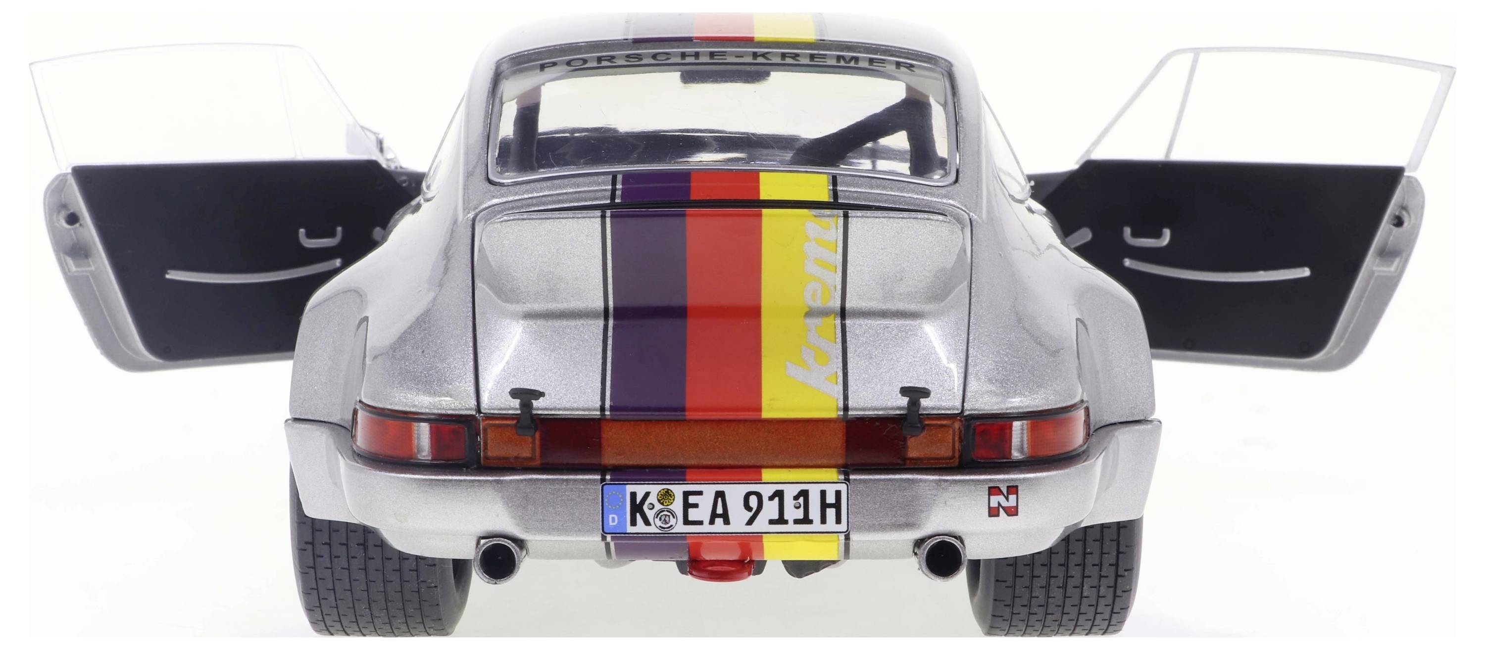 Solido Porsche 911 RSR Kremer 1973 silber 1:18 Modellauto