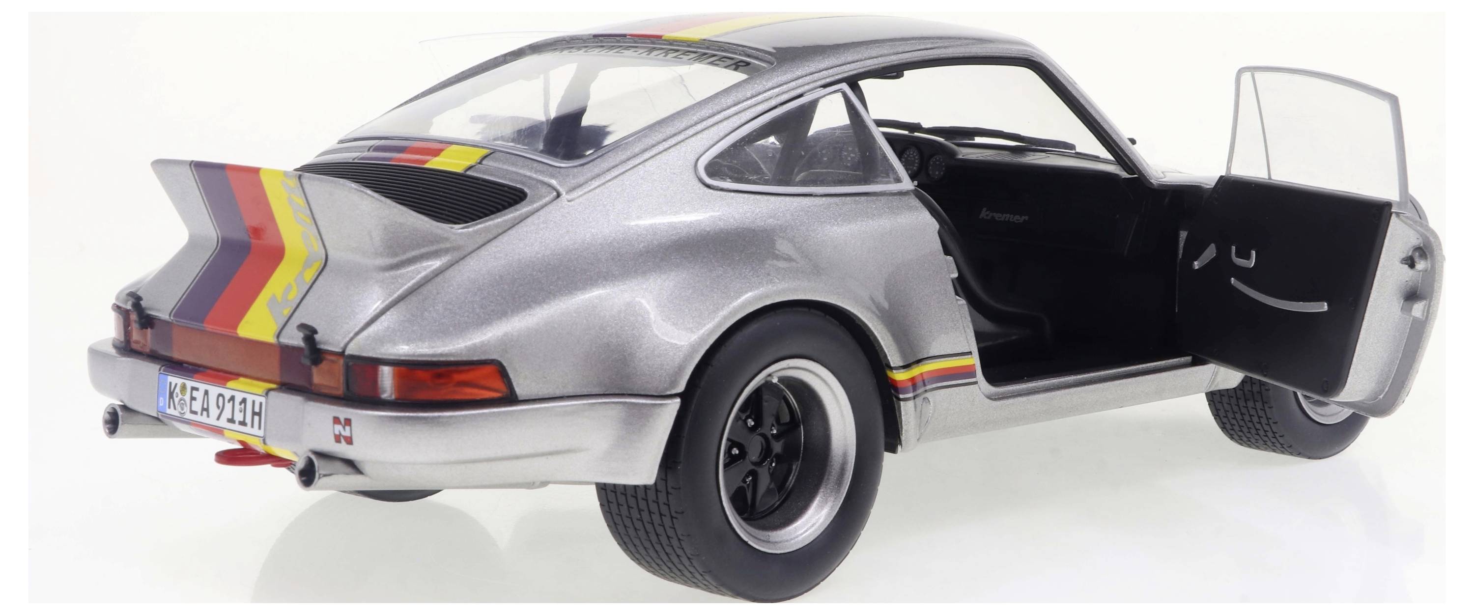 Solido Porsche 911 RSR Kremer 1973 silber 1:18 Modellauto