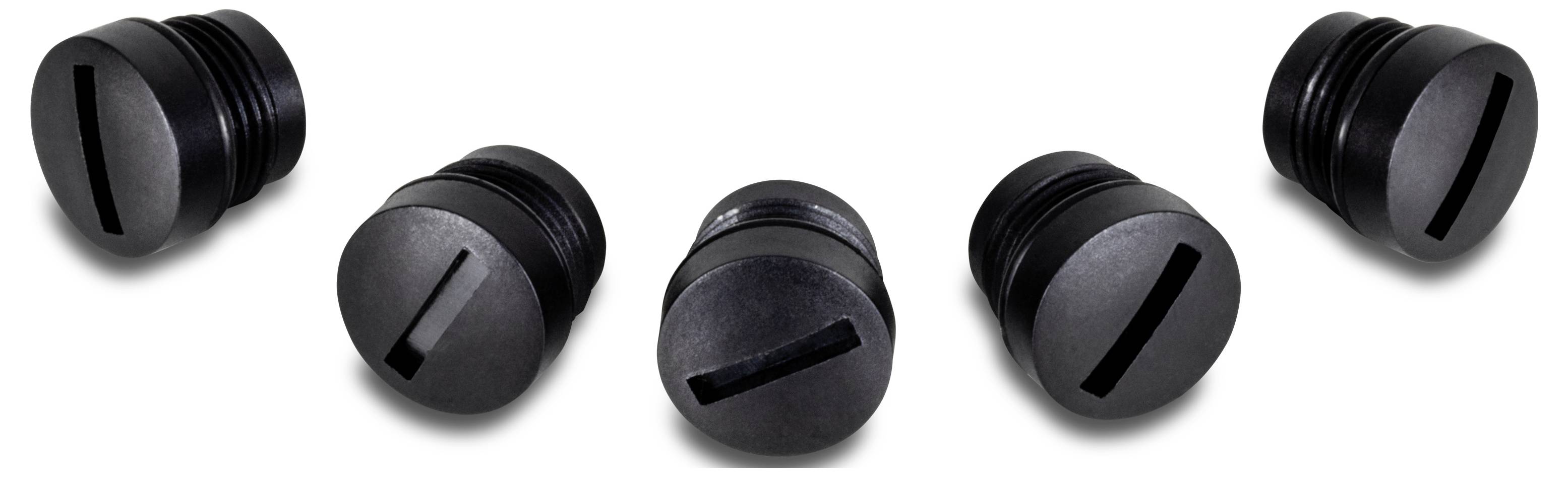 Fünf schwarze, zylindrische Komponenten mit unterschiedlichen Schlitzmustern liegen in einer Reihe auf einem weißen Hintergrund.