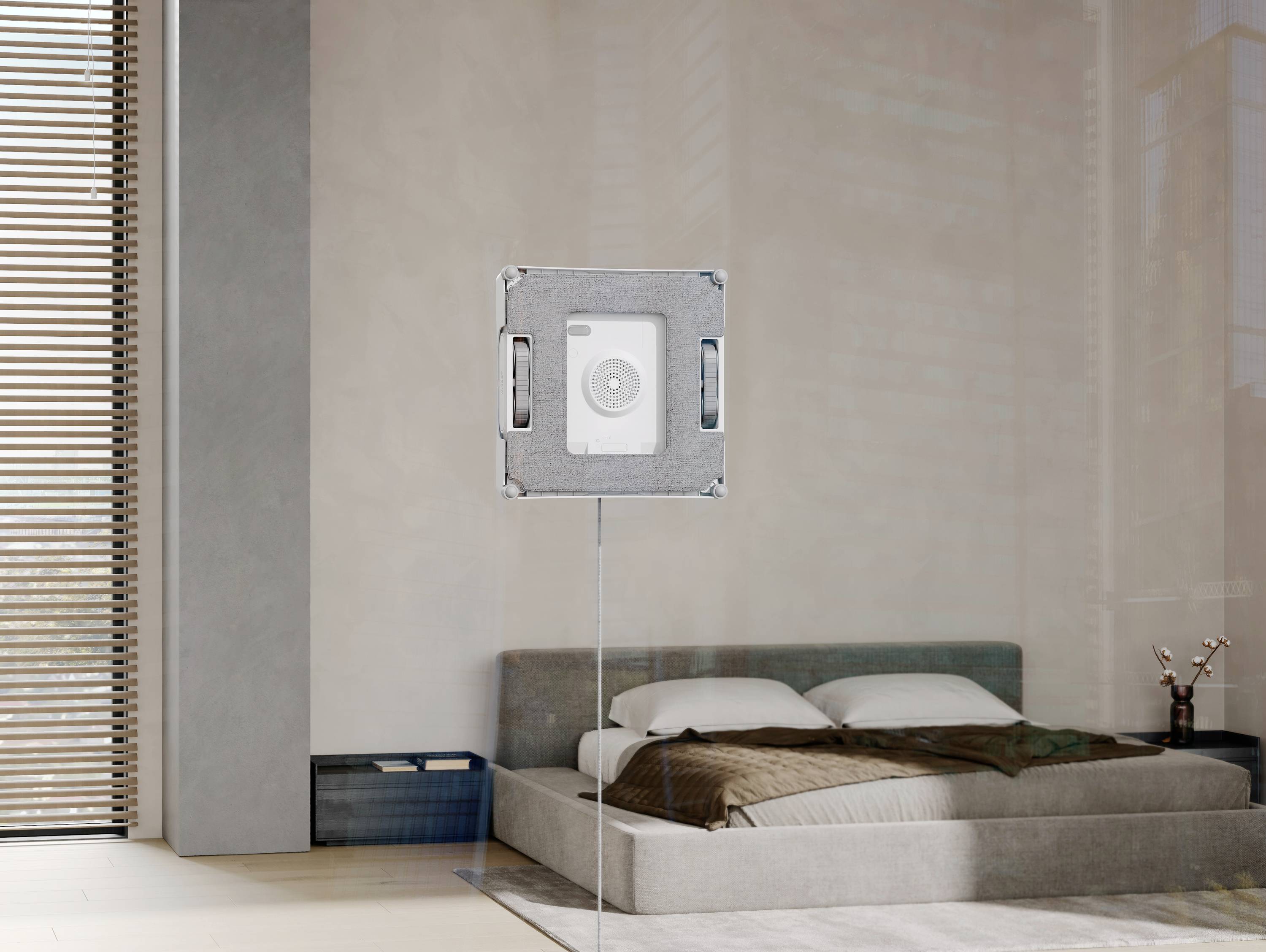 Ein modernes, minimalistisches Schlafzimmer mit einem großen Bett, neutralen Farben und einem Kunstwerk an der Wand.