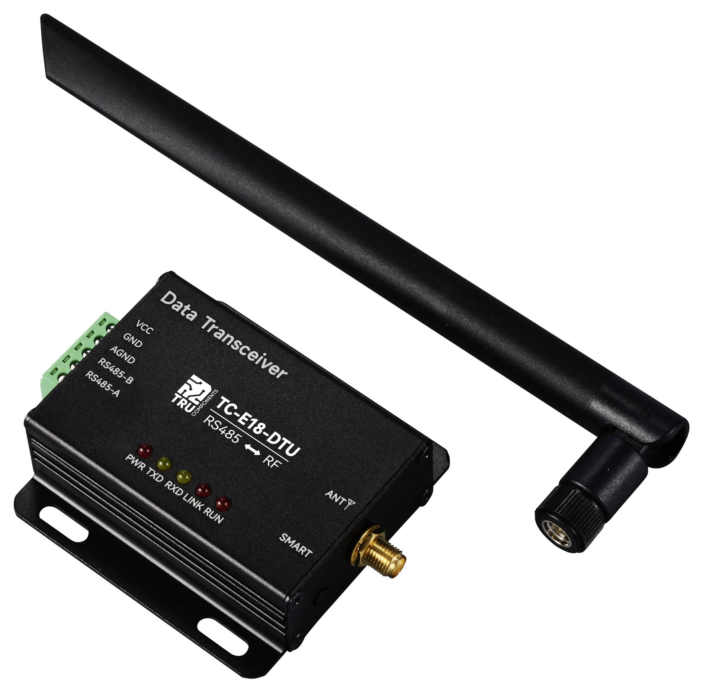 Ein schwarzer Funk-Datenüberträger mit einer langen Antenne, beschriftet mit 'Data Transceiver TC-E18-DTU'. Er verfügt über mehrere Anschlüsse.