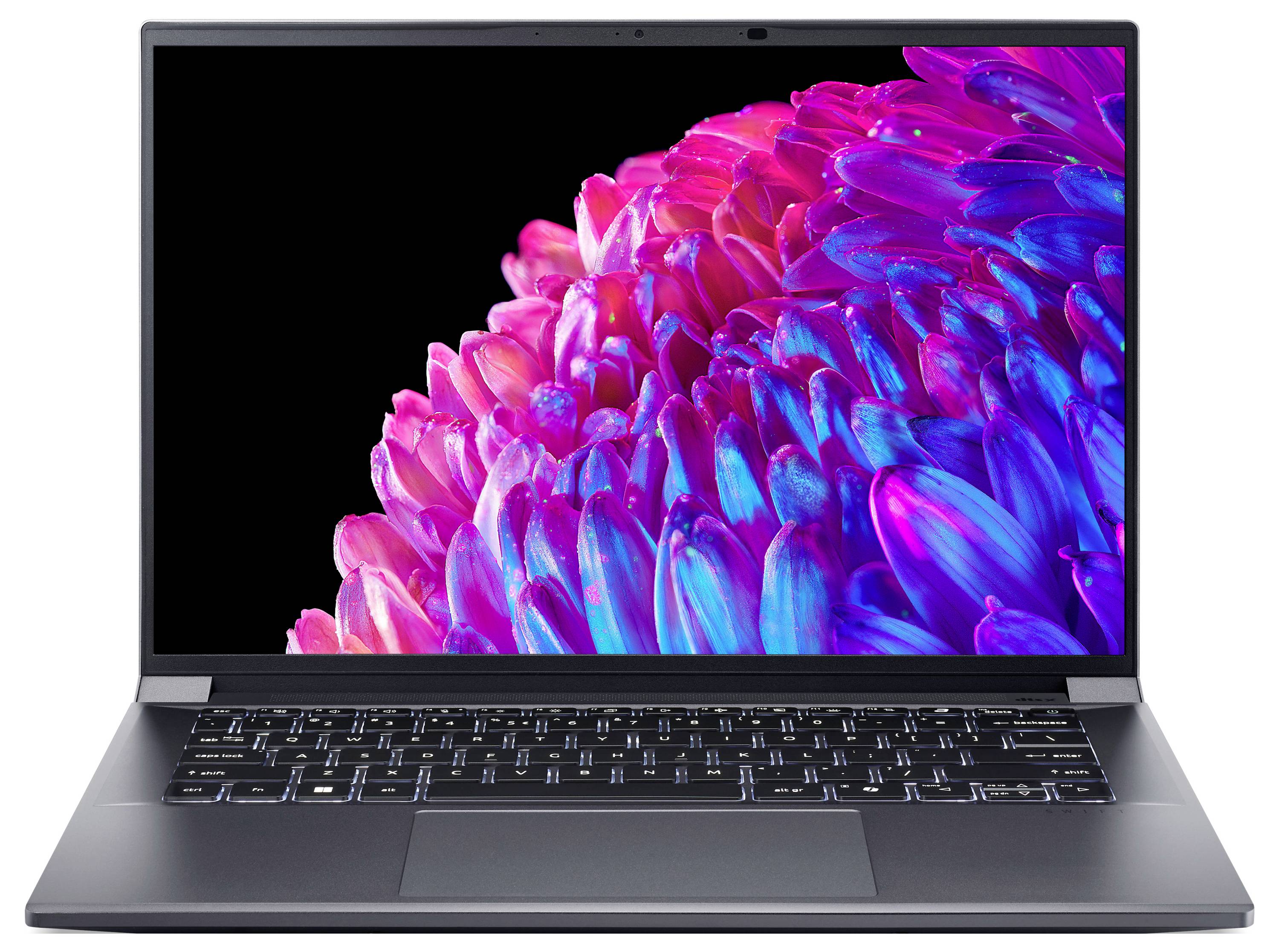Laptop mit Bild eines bunten, abstrakten Blütenmotivs auf dem Bildschirm.