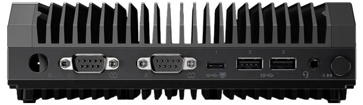 Kompakter schwarzer Mini-PC mit mehreren Anschlüssen auf der Rückseite, darunter zwei serielle, zwei USB-, HDMI-Anschlüsse und ein Netzschalter.
