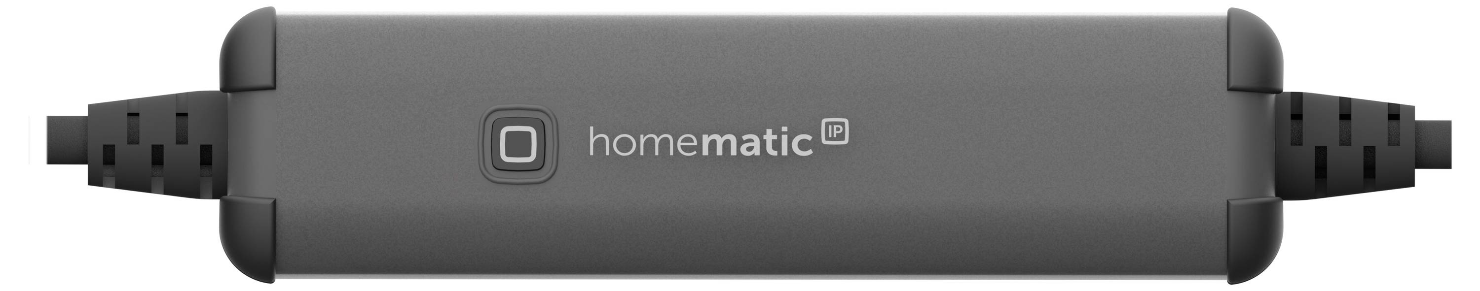 Schwarzes Homematic-Gerät mit quadratischem Logo und Text 'homematic IP' in der Mitte, seitlich mit zwei Kabeln verbunden.