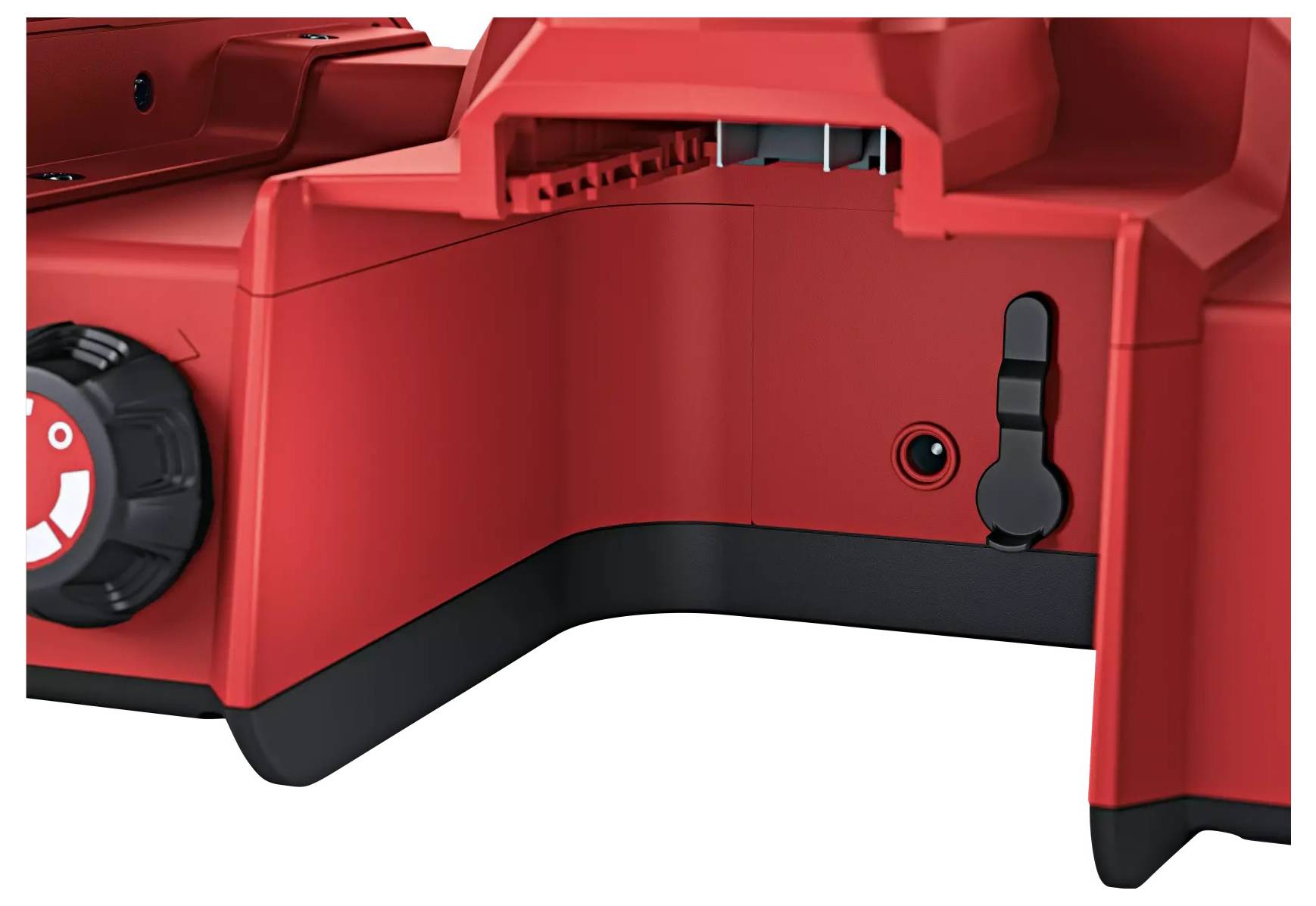 Roter Kunststoffbauteil mit schwarzem Regler. Schneidwerkzeugeinsatz oben.