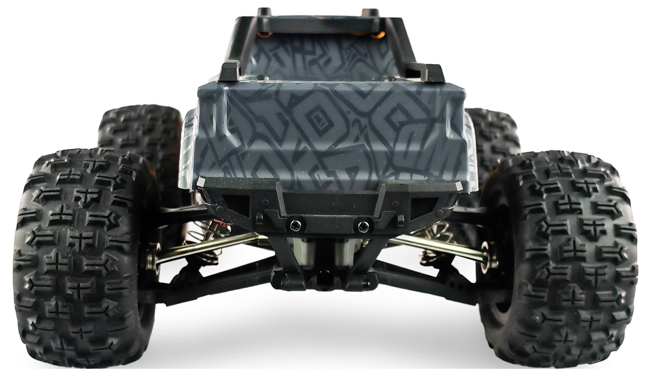 Ein ferngesteuertes Auto mit großen, robusten Rädern und einer gemusterten Karosserie wird von vorne gezeigt.