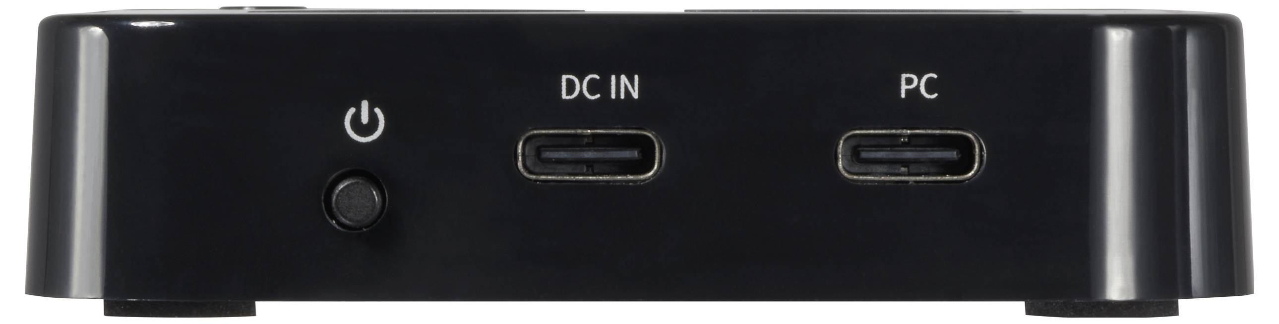 Schwarzes elektronisches Gerät mit zwei USB-C-Anschlüssen, beschriftet mit 'DC IN' und 'PC', sowie einem Ein-/Ausschalter links.