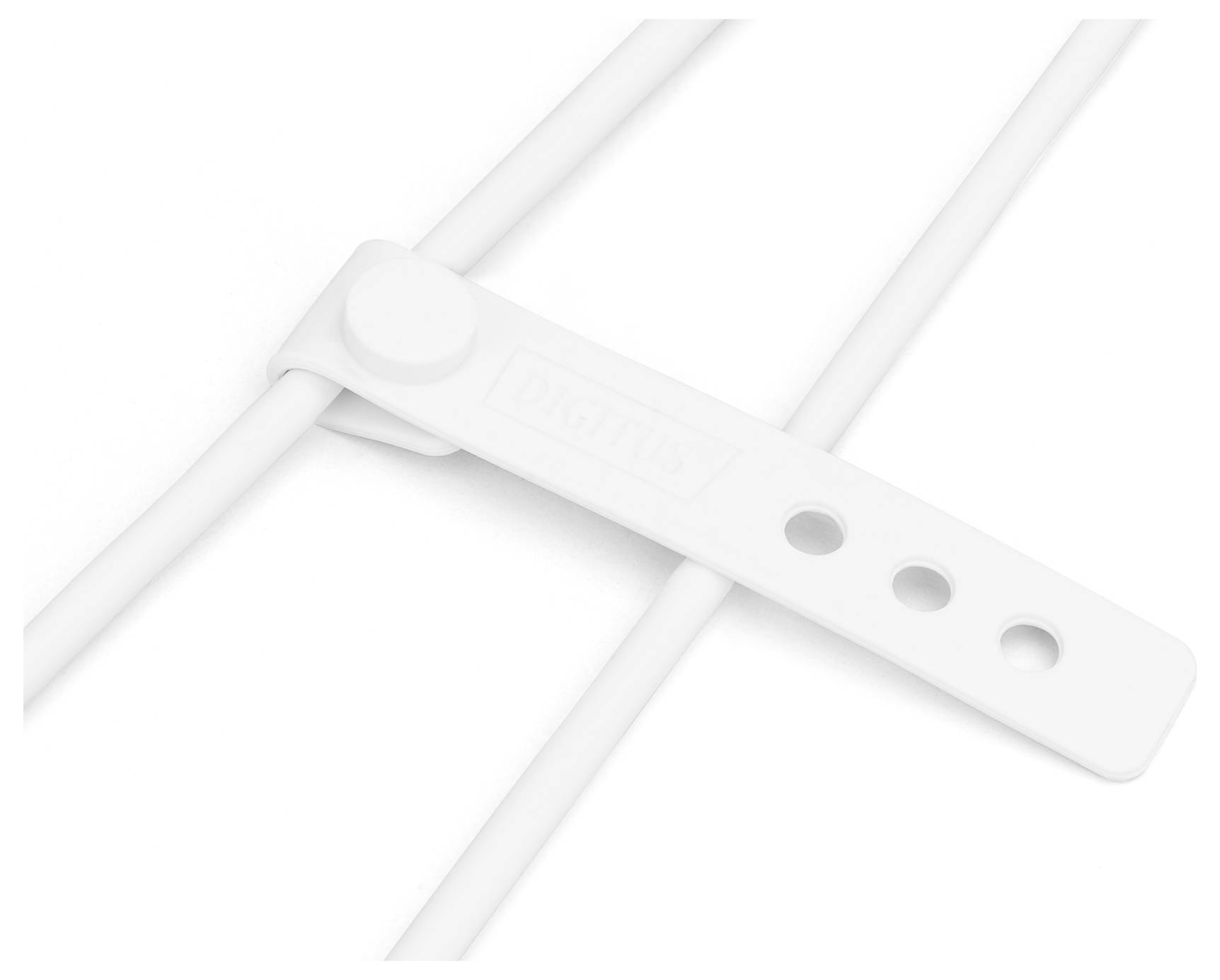 Ein weißer Kabelhalter organisiert mehrere Kabel, hält sie sicher zusammen. Geeignet, um Kabelsalat zu vermeiden.