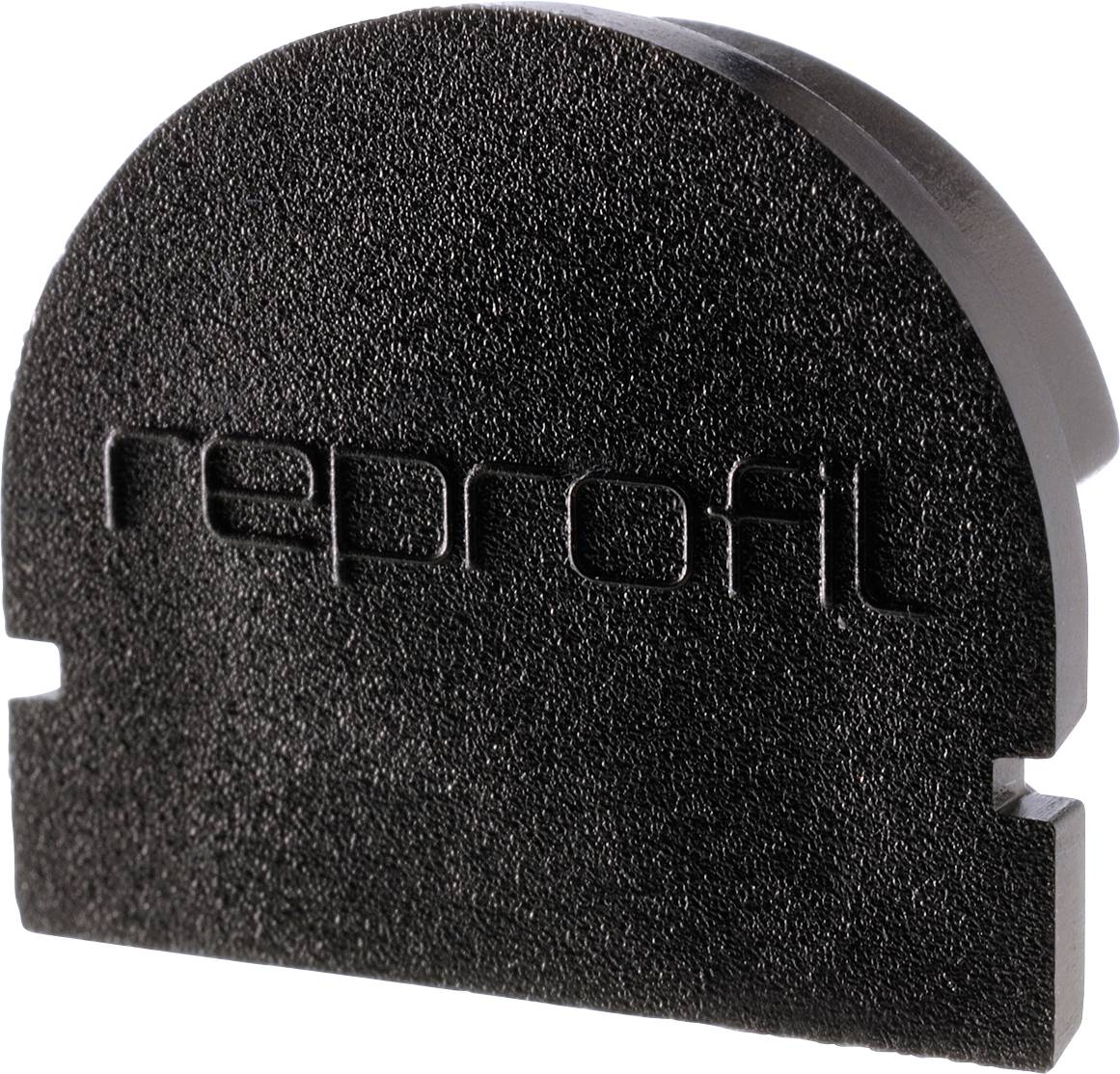 Ein schwarzes Kunststoffteil mit der Prägung 'reprofil'. Halbkreisförmig, strukturiert.