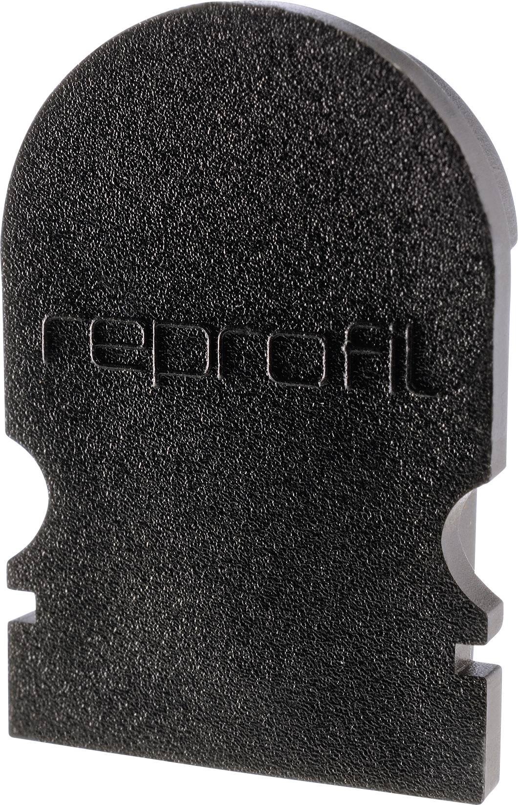 Schwarzer Kunststoffaufsatz mit der Prägung 'reprofil', wahrscheinlich ein Bestandteil oder Zubehör für ein spezielles Gerät oder System.