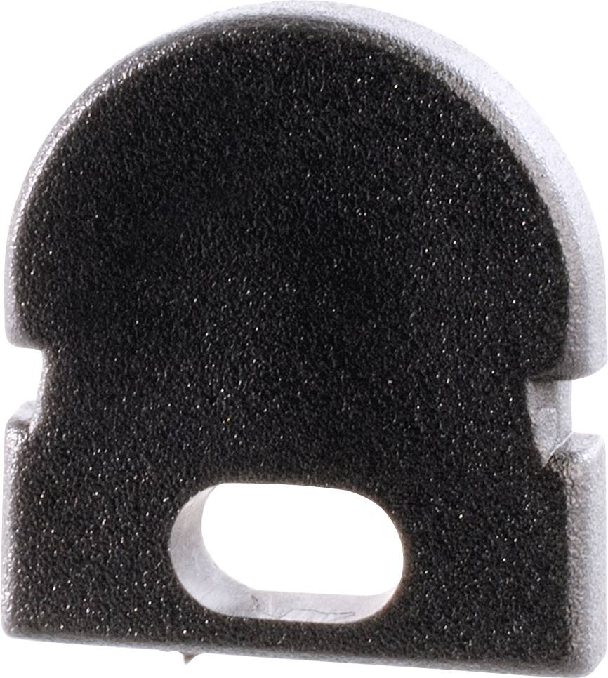 Ein schwarzer Schaumstoffeinsatz mit rechteckigem Basisschlitz und rundlicher Oberseite, möglicherweise Teil eines größeren Geräts.