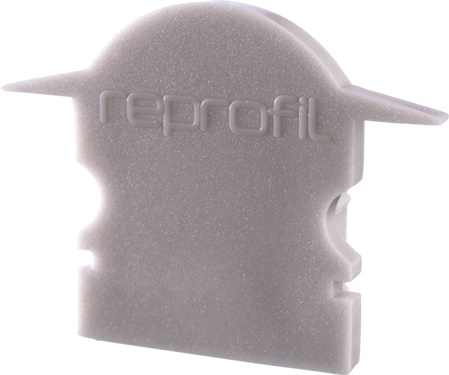 Ein grauer Kunststoffblock mit Aufschrift 'reprofil', dient als Bauteil für technische Anwendungen oder Modellbau.