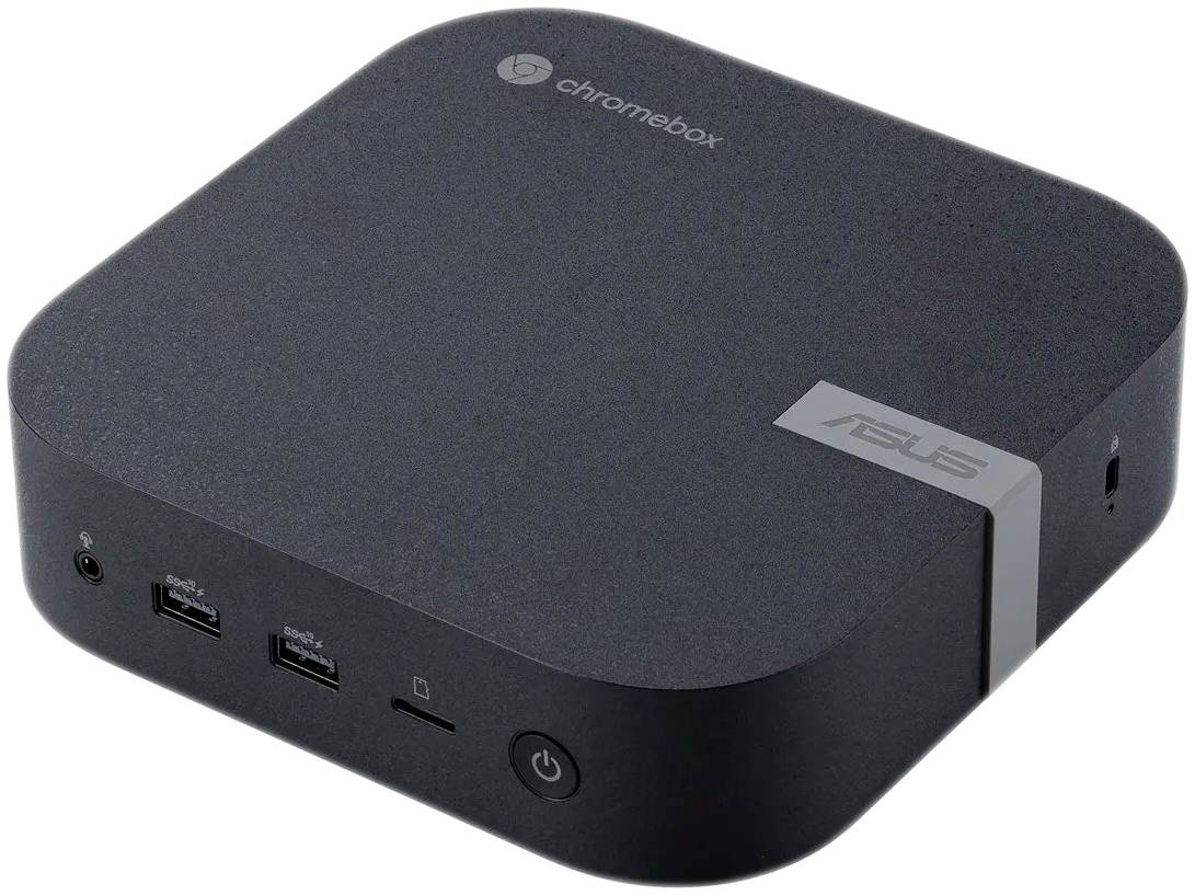 Ein ASUS Chromebox in schwarzem Gehäuse mit zwei USB-Anschlüssen, einem SD-Kartenleser und einem runden Einschaltknopf vorne.