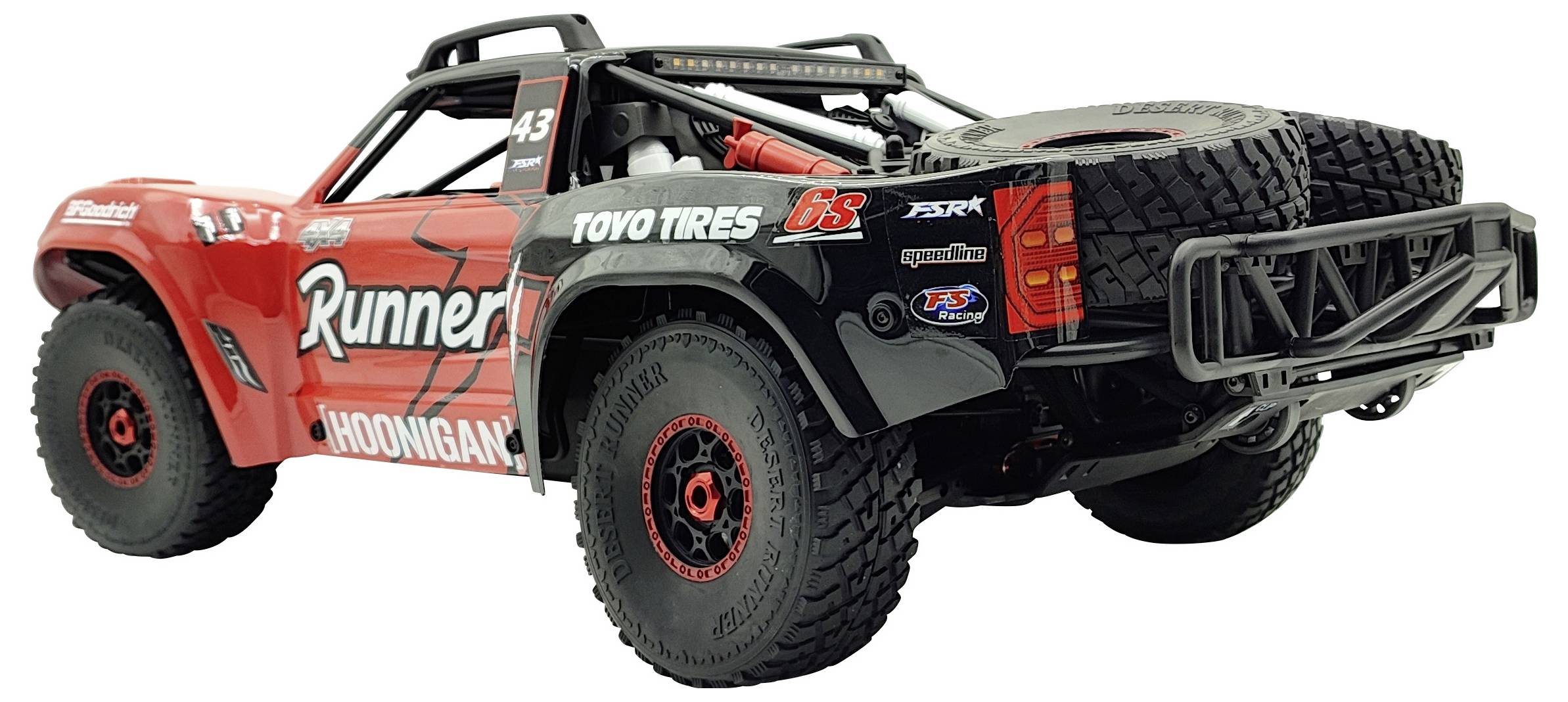 Ein ferngesteuertes Modellauto mit breiten Reifen und einem Ersatzreifen auf der Rückseite. Das Design ist sportlich mit 'Runner' Aufschrift.