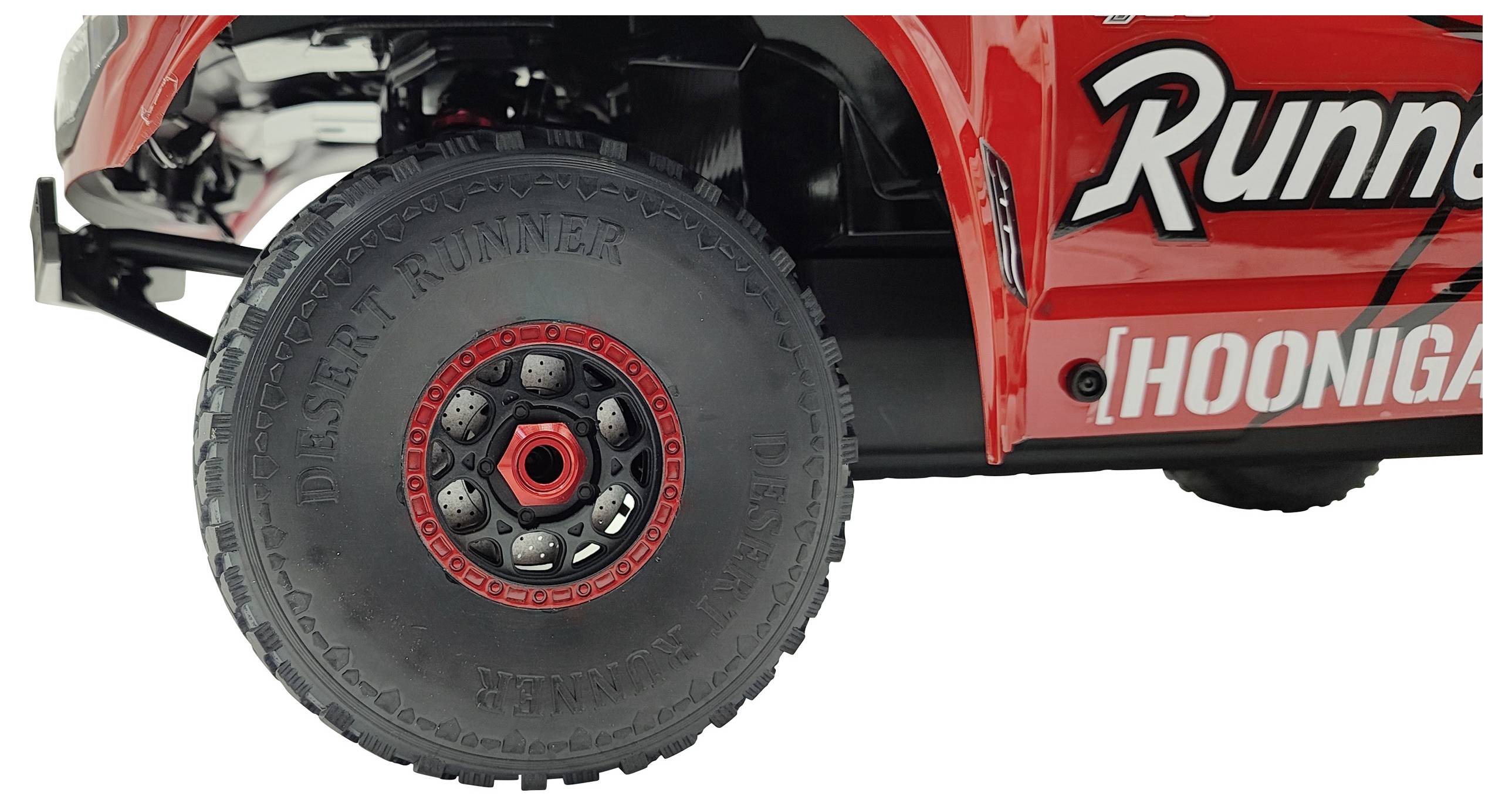 Rotes Spielzeugauto von der Seite, zeigt ein robustes Rad mit großen Profilreifen. Text auf dem Auto: 'Runner' und '[HOONIGAN]'.