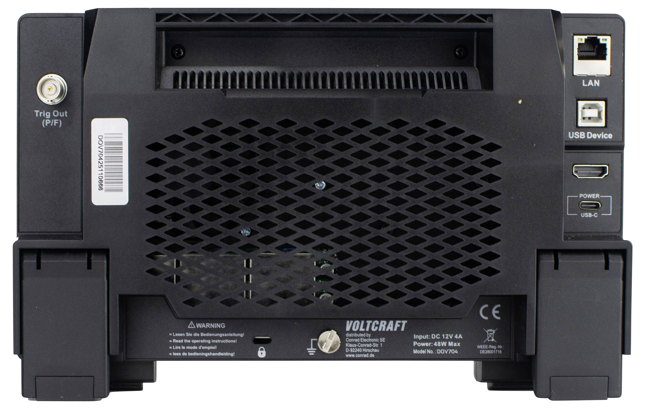 Rückseite eines elektronischen Geräts mit LAN- und USB-Anschlüssen. Aufschrift: 'Voltcraft'. Enthält Lüftungsschlitze und Stromanschluss.