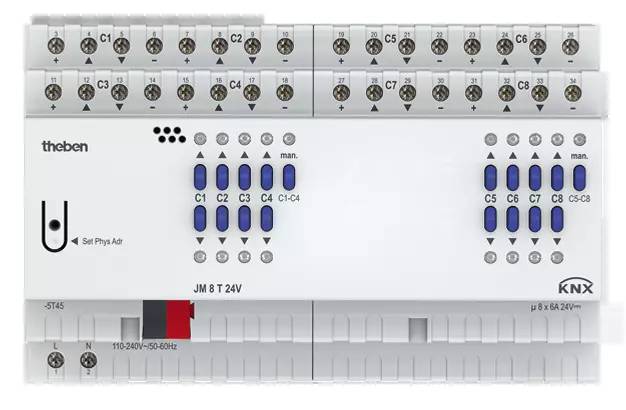 Abbildung eines JM 8 T 24V Elektronikmoduls mit verschiedenen Schraubklemmen, blauen Schaltern und detaillierter Anschlussbeschriftung.