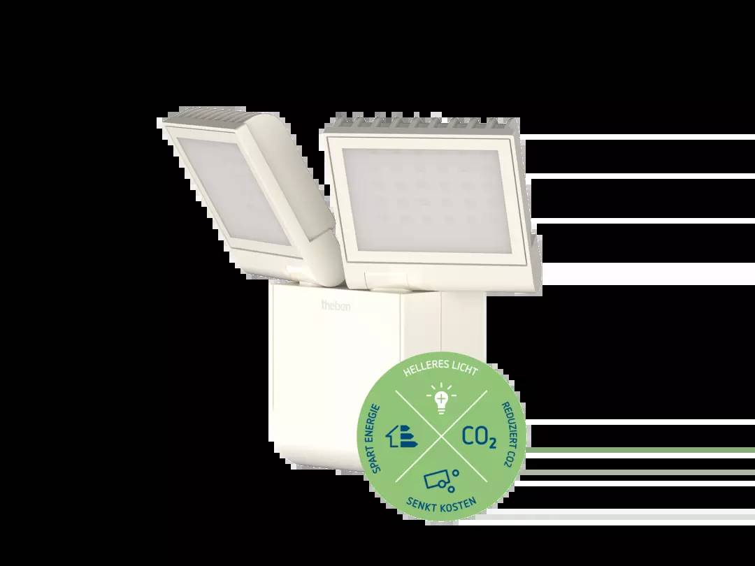 LED-Lampe mit zwei rechteckigen Leuchten. Ein grünes Label zeigt Symbole für Energie sparen, helleres Licht und CO2-Reduktion.