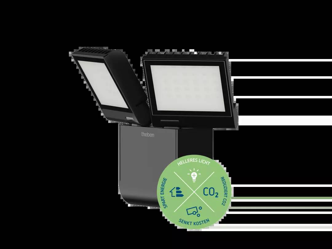 Ein LED-Strahler mit zwei Leuchtflächen, daneben ein Kreis mit Piktogrammen und Text: 'Spart Energie, Helleres Licht, Reduziert CO2, Senkt Kosten'.