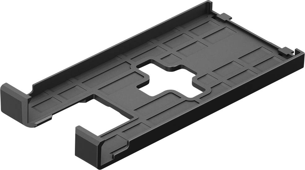 Schwarzes, rechteckiges Kunststoffteil mit erhöhten Kanten und einem Kreuzmuster in der Mitte, möglicherweise ein Halterahmen oder eine Halterungskomponente.