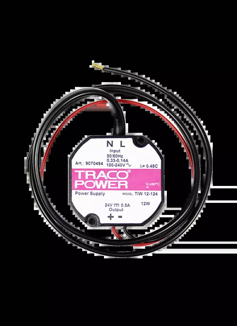 Ein rundes Netzteil von Traco Power mit Kabeln. Aufschrift: 'TRACO POWER', Eingang: 50/60Hz, 0,3-0,14A, 100-240V, Ausgang: 24V, 0,5A, 12W.