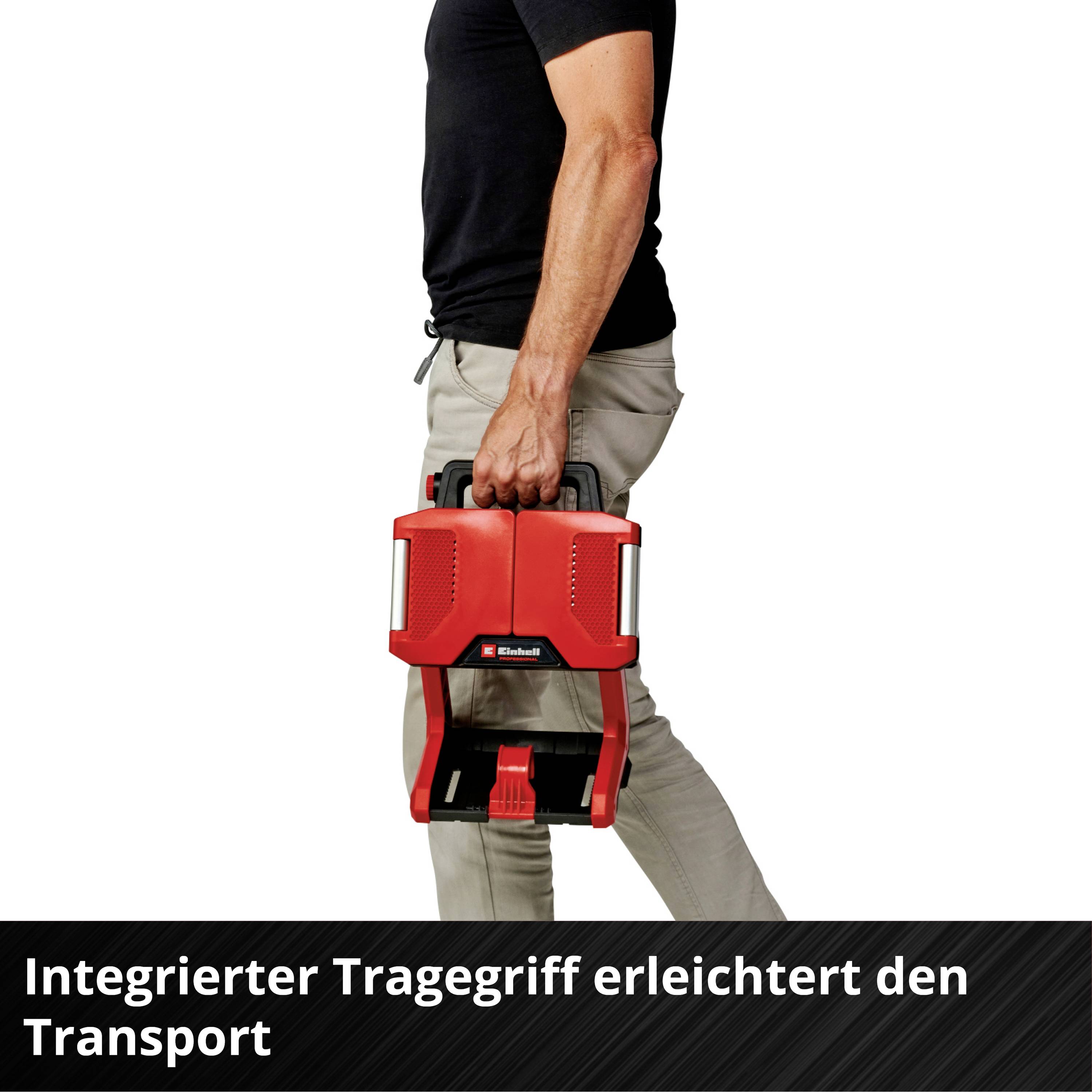 Person hält ein tragbares Gerät mit roten Akzenten. Text besagt: 'Integrierter Tragegriff erleichtert den Transport'.