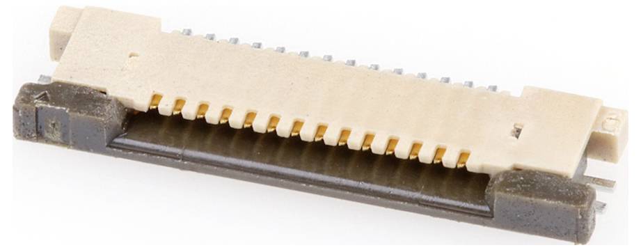 Ein Nahaufnahmebild eines beige- und schwarzfarbigen elektrischen Steckers mit mehreren Metallstiften, der für Verbindungen in elektronischen Geräten verwendet wird.