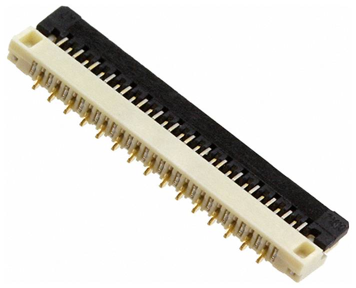 Ein kleiner beige- und braun farbener elektronischer Stecker für flache Kabel, mit mehreren kleinen Stiften und rechteckiger Form.