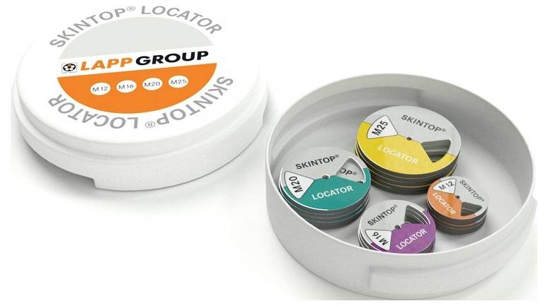 Runder weißer Behälter mit Deckel, der 'Skintop Locator Lapp Group' zeigt, enthält farbige, beschriftete Scheiben zur Kabelmessung.