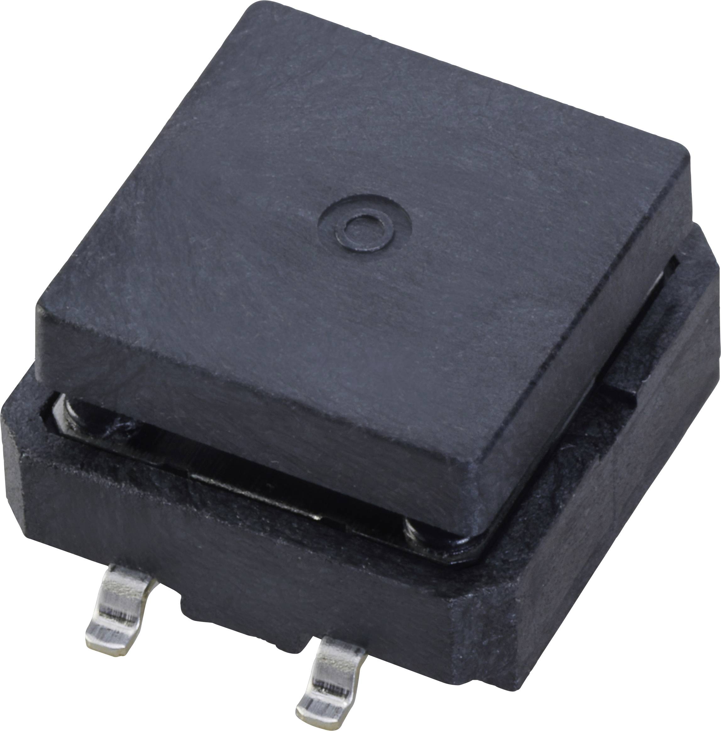 Schwarze elektronische Komponente mit quadratischer Form und zwei Metallanschlüssen an der Unterseite, auf einer hellen Oberfläche.