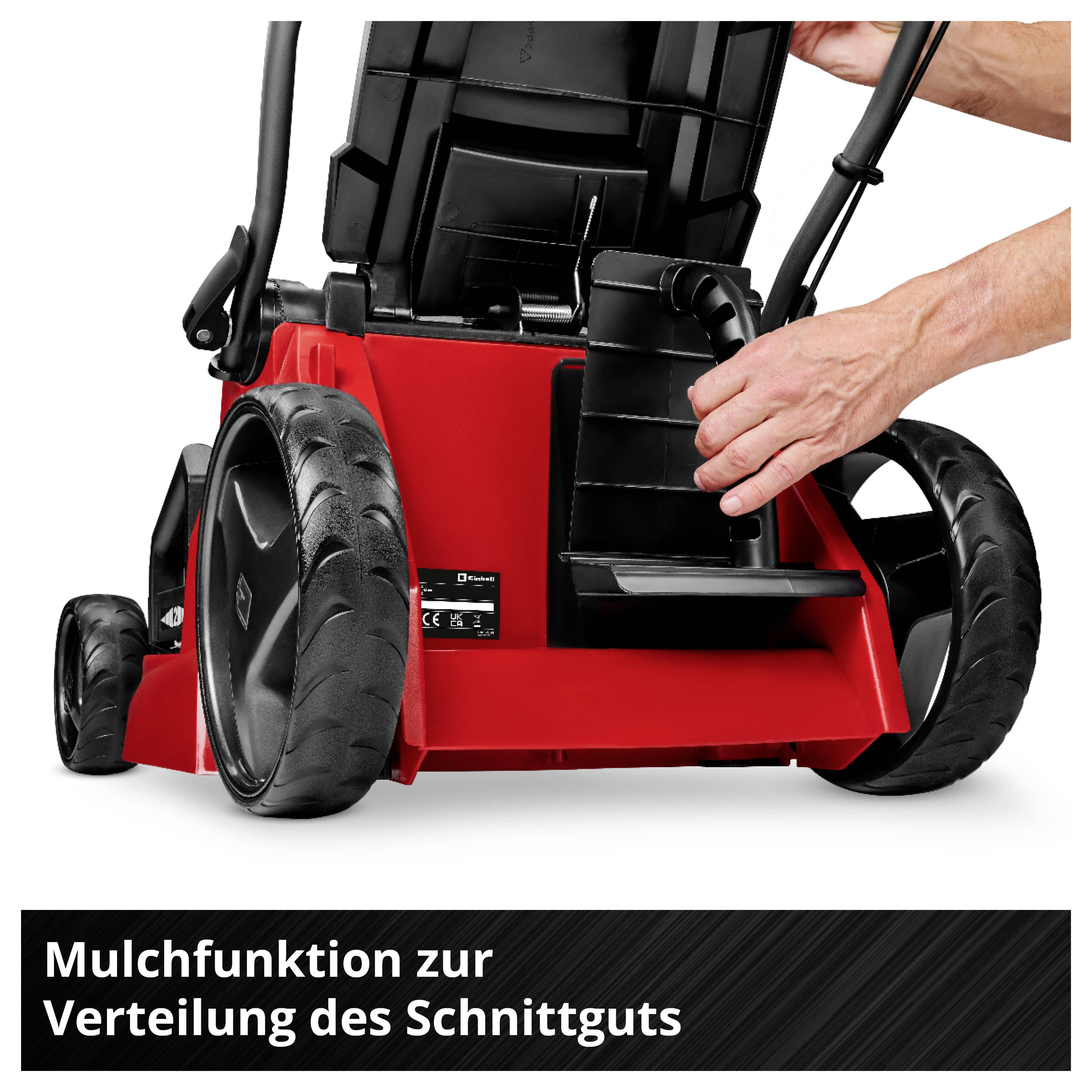 Rasenmäher mit Mulchfunktion; Hand zeigt Einsetzen des Mulch-Einsatzes. Text: 'Mulchfunktion zur Verteilung des Schnittguts'.