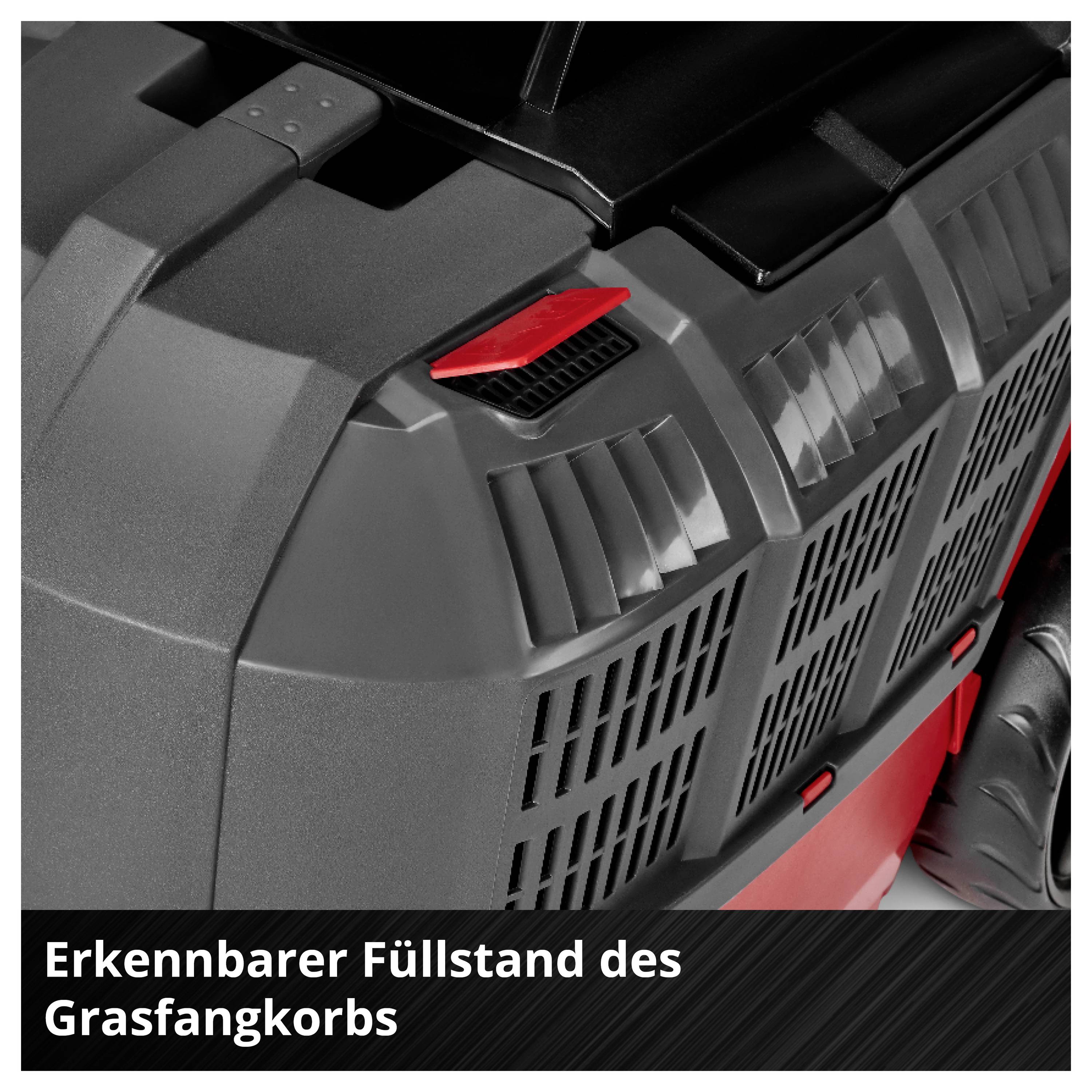 Nahaufnahme eines Rasenmäher-Grasfangkorbs mit sichtbarer Füllstandsanzeige; Text: 'Erkennbarer Füllstand des Grasfangkorbs'.