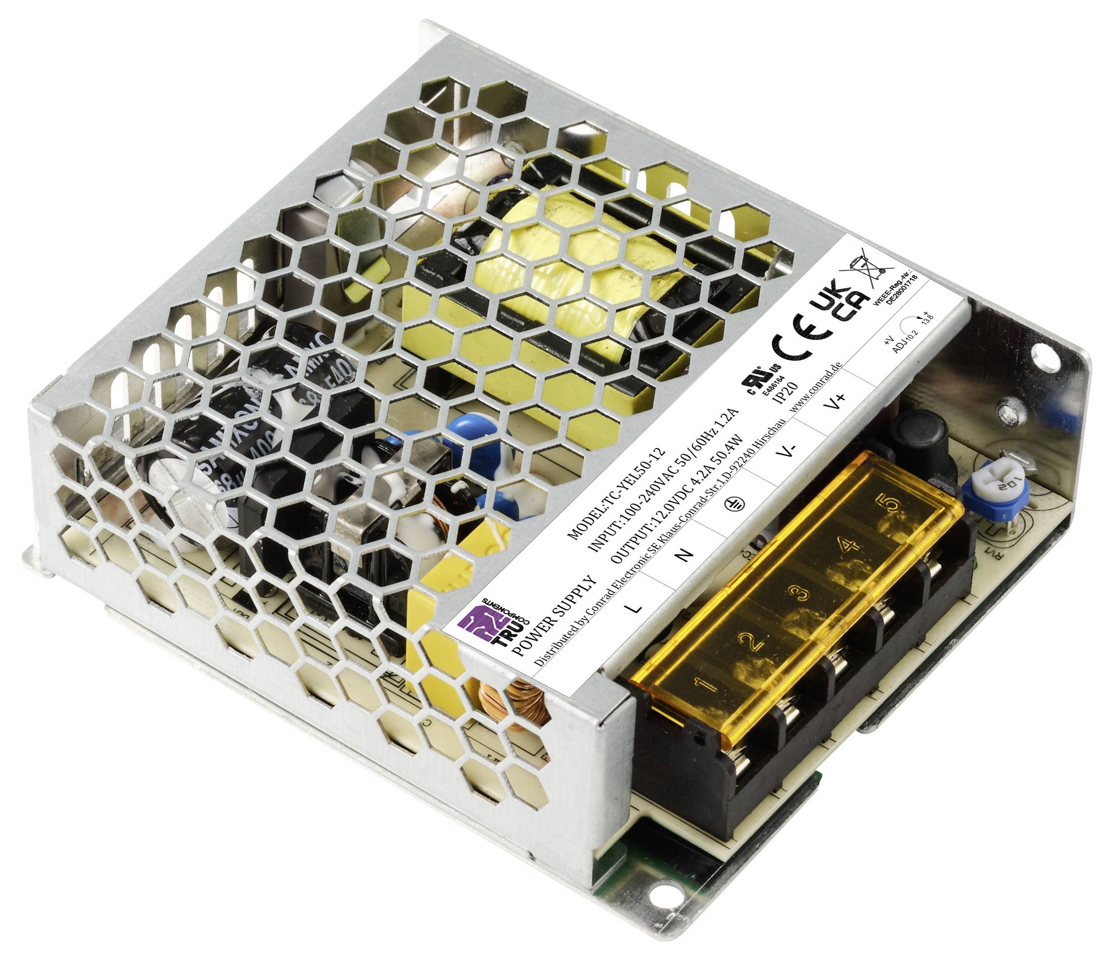 Metallisches Gehäuse mit Gittermuster beherbergt ein Schaltnetzteil. Etikett zeigt technische Daten und Sicherheitszertifikate. Hauptanschlüsse an der Seite.