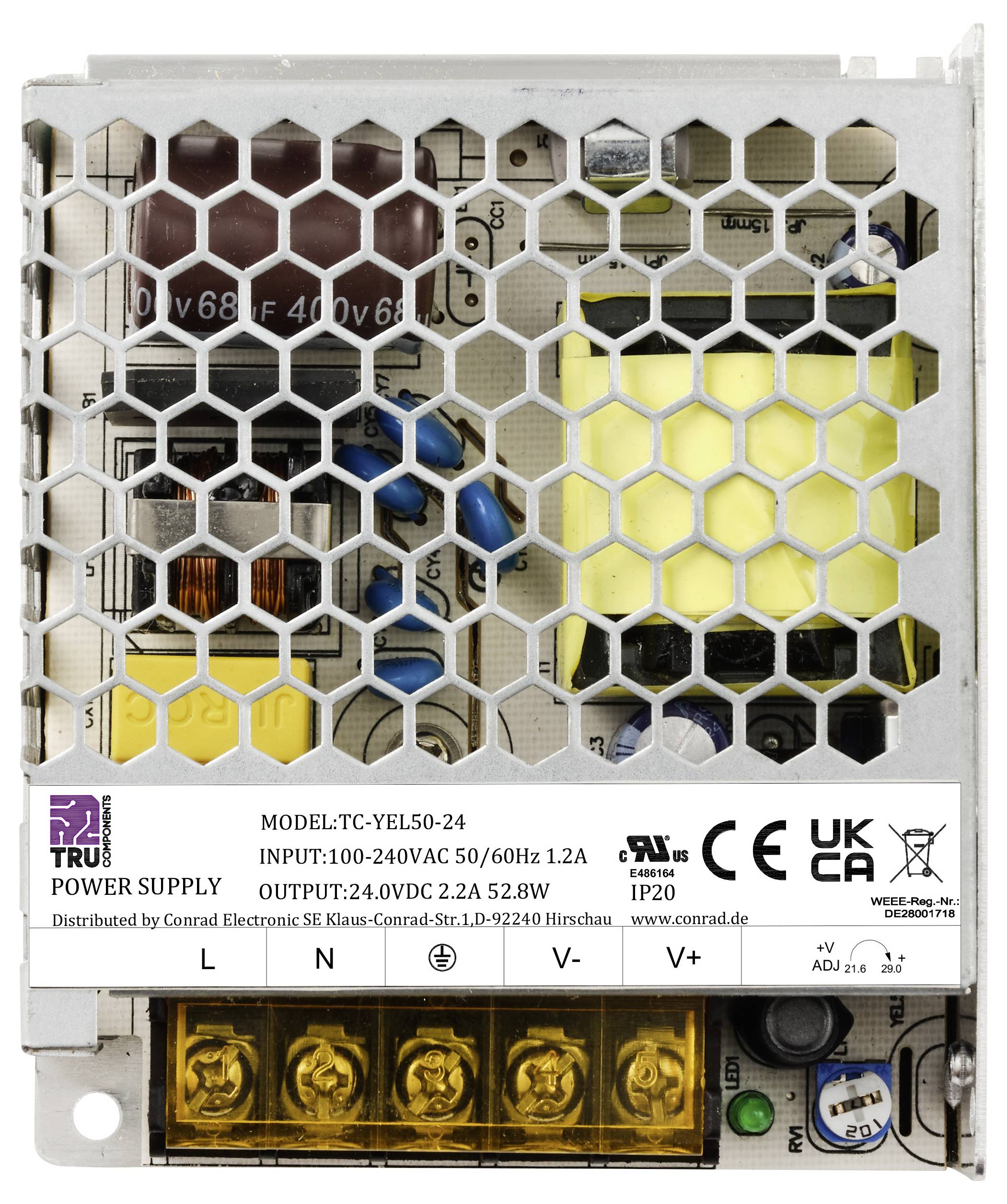Ein Netzteil im Metallgehäuse mit sichtbaren elektronischen Bauteilen und einer Beschriftung über Modell: 'TC-YEL50-24', Leistung: 24VDC 2,2A.