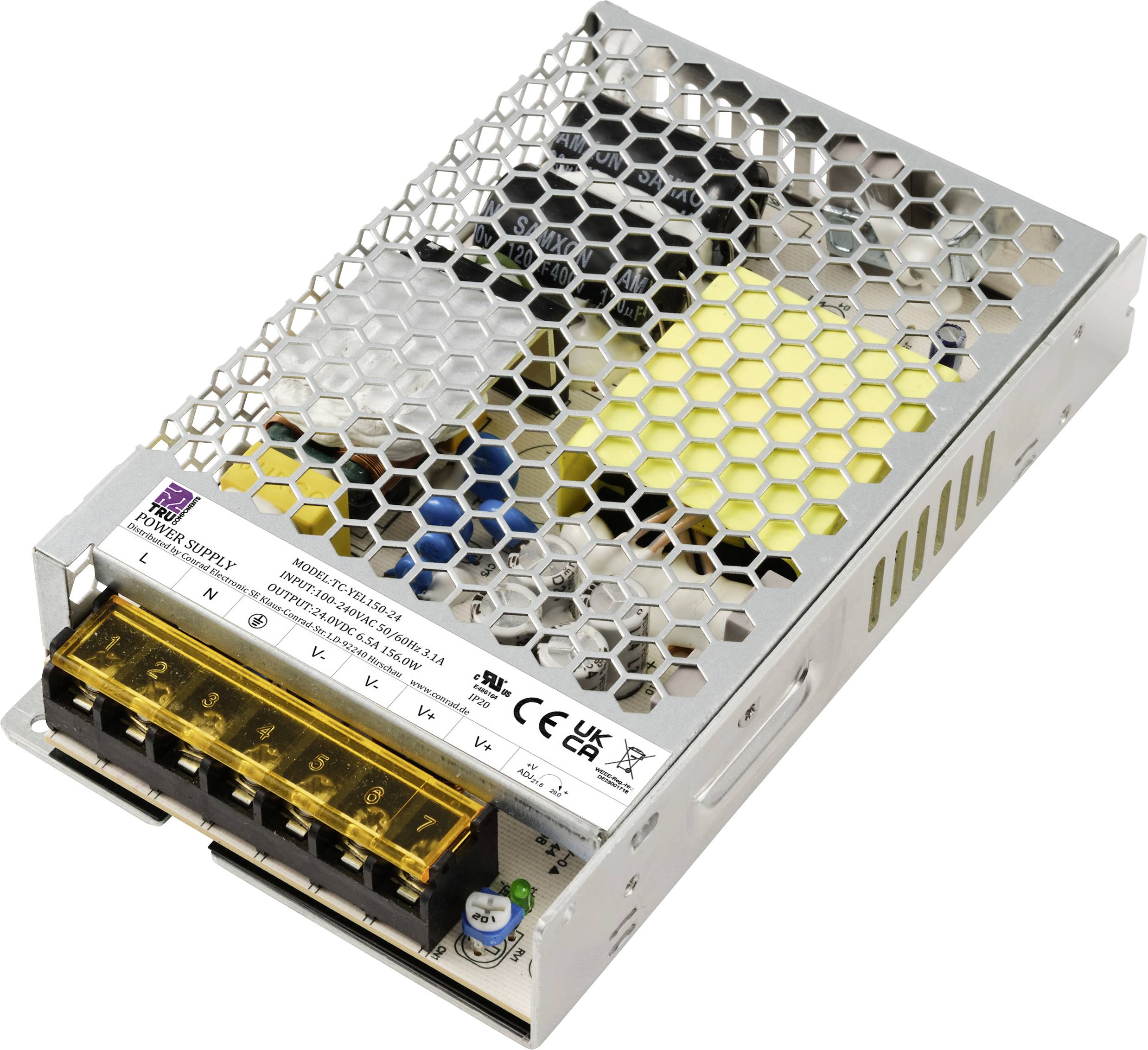 Ein offenes Metallgehäuse eines Schaltnetzteils mit sichtbaren elektronischen Komponenten und gelben Kabelverbindungen.