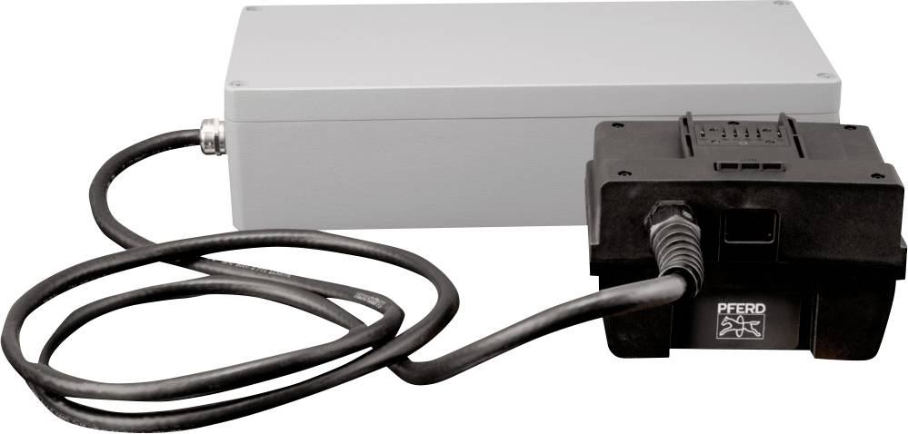 Ein schwarzes Gerät mit Plexiglas-Gehäuse und einem langen Kabel, das zu einer grauen rechteckigen Box führt, liegt auf einer weißen Fläche.